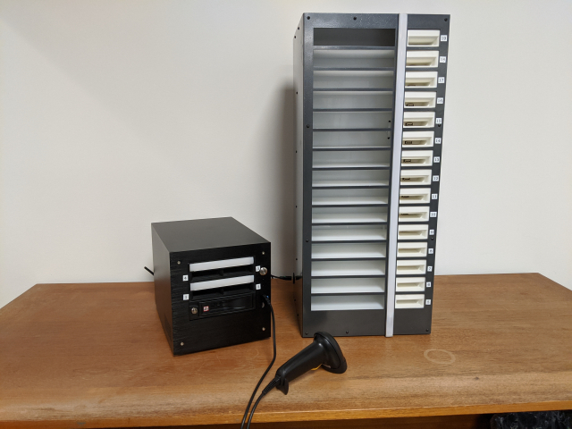 A scribe system, including the tower, mini, and scanner, sitting on a table in the Keystone offices.